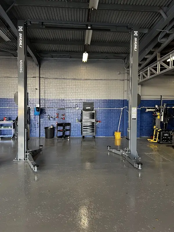 Clean Time4Tune service bay and vehicle lift