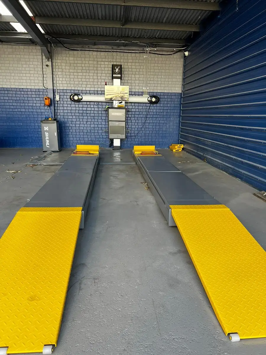 Wheel alignment ramps inside the Time4Tune workshop